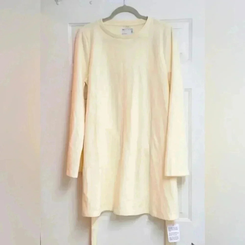 ASOS DESIGN Petite supersoft flare sleeve sweater swing mini dress with belt